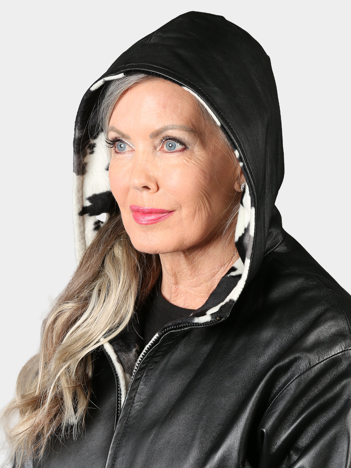 Woman's Black Hooded Leather Jacket Reversible to Cow Print Fabric